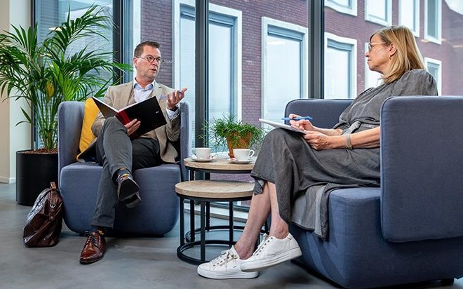 Man and wife sitting